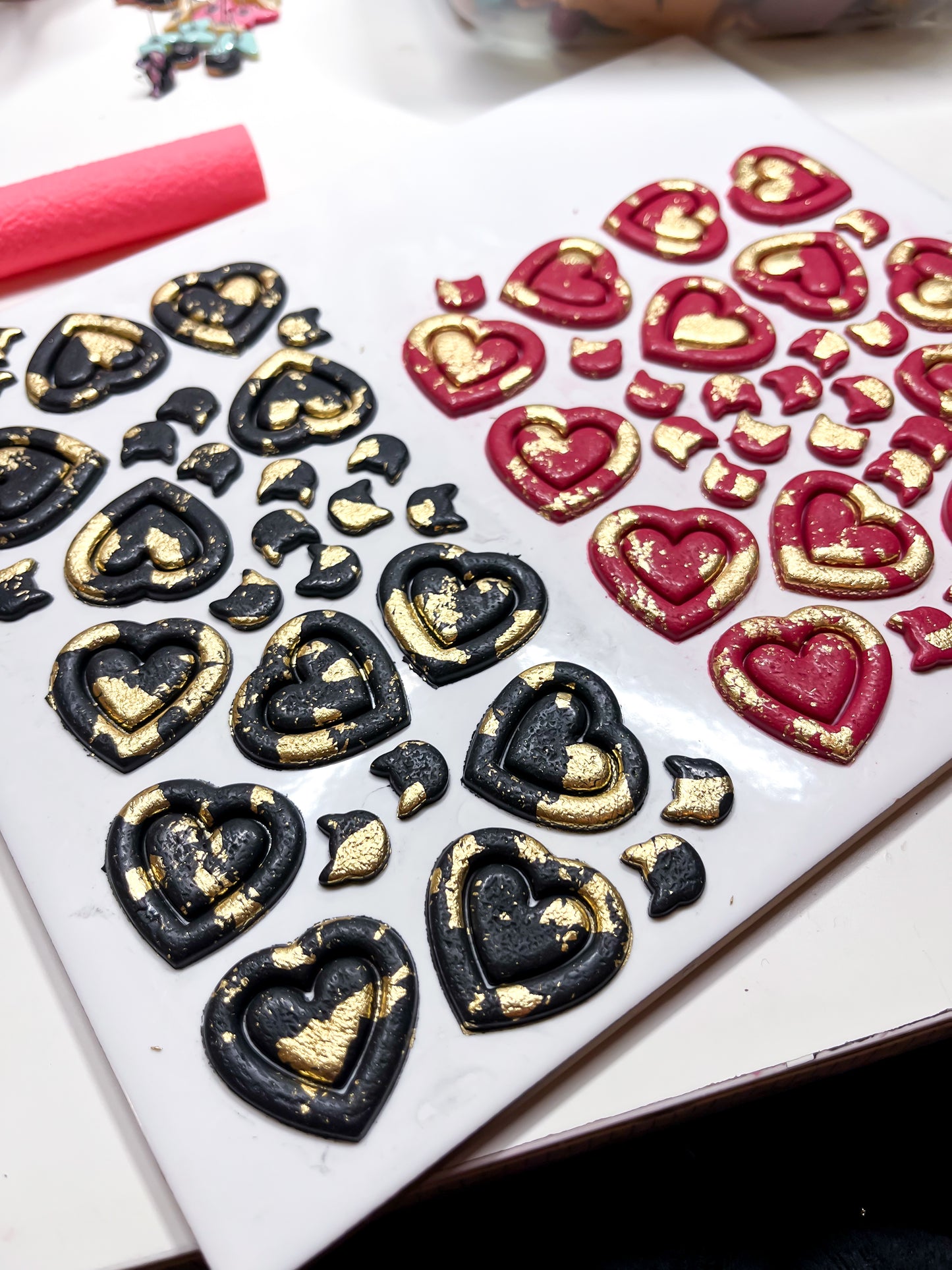 Foiled Cat Studs - red or black